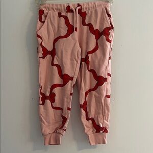 Mini Rodini Pink Joggers with Red Bow Pattern